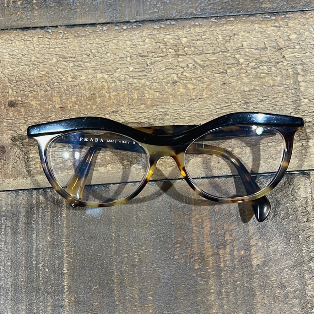 Prada cat eye eyeglasses. They have a light astigmatism prescription.